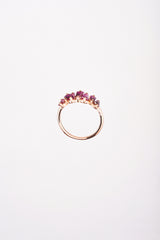 Churumbela en oro rosa con rubíes irregulares